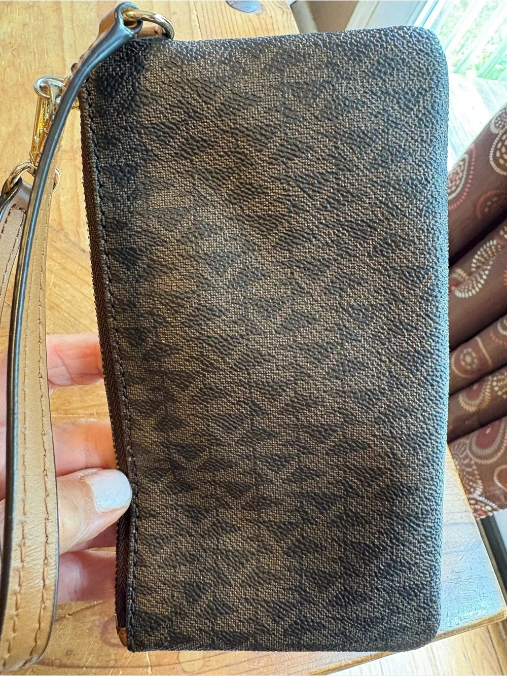 Michael Kors Brown and Tan Signature Wristlet with Gold Plate
